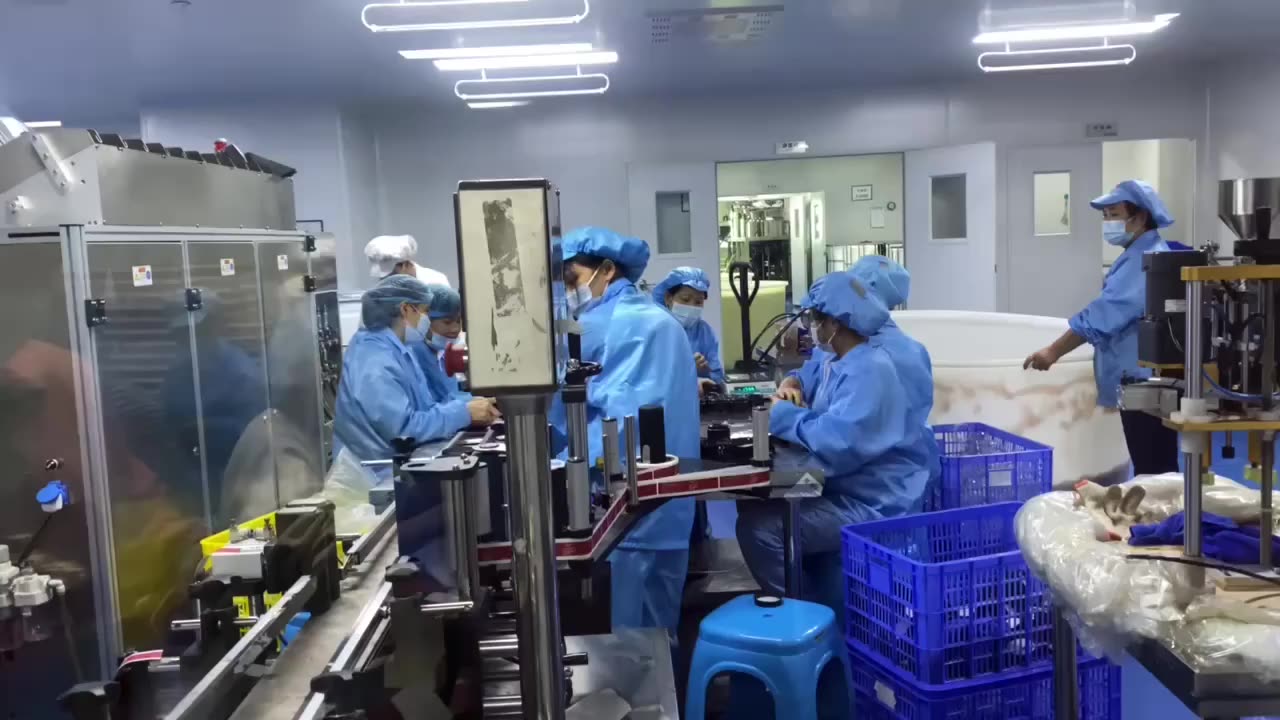 A Food Worker Checks The Temperature Of Melon Pieces